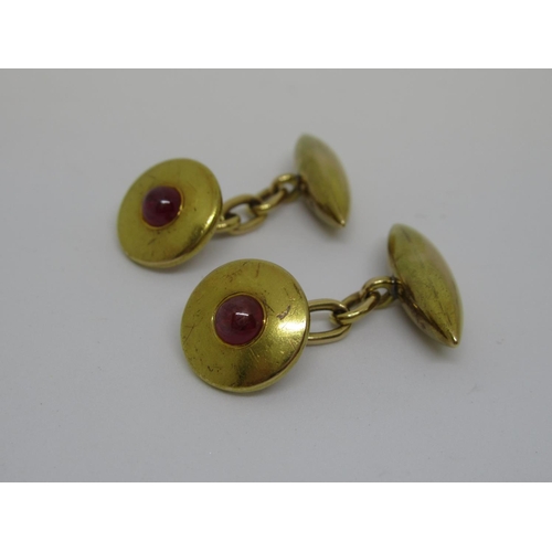 1099 - Pair of 15ct cabochon stone set cufflinks