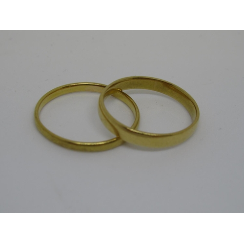 1115 - Two 22ct gold wedding bands