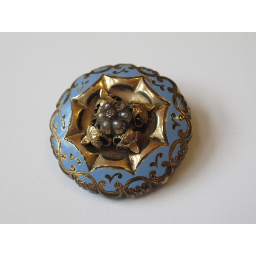 1125 - Victorian circular enamel decorated brooch set seed pearls and a diamond chip (minus one seed pearl ... 