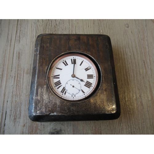 1134 - Silver mounted leather travelling pocket watch case containing a large nickel plated pocket watch