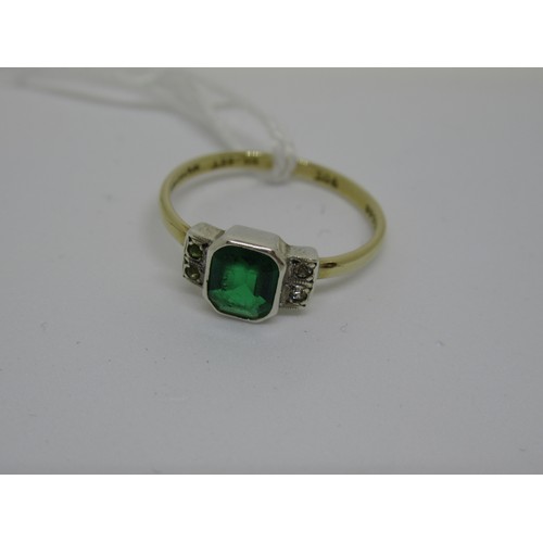 1069 - 9ct Gold and silver dress ring set green stone