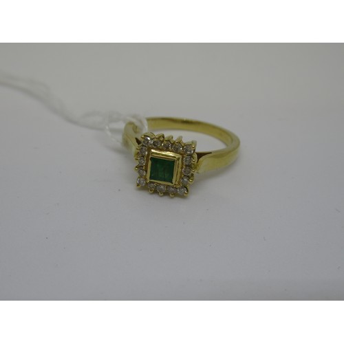 1068 - 18ct Gold emerald and diamond ring