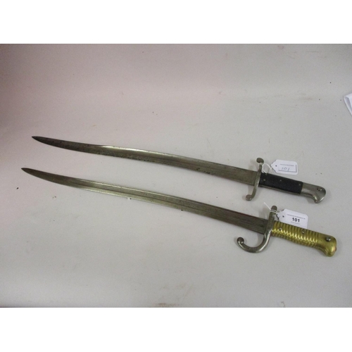 101 - French 1872 pattern bayonet with brass grip together with a similar British bayonet