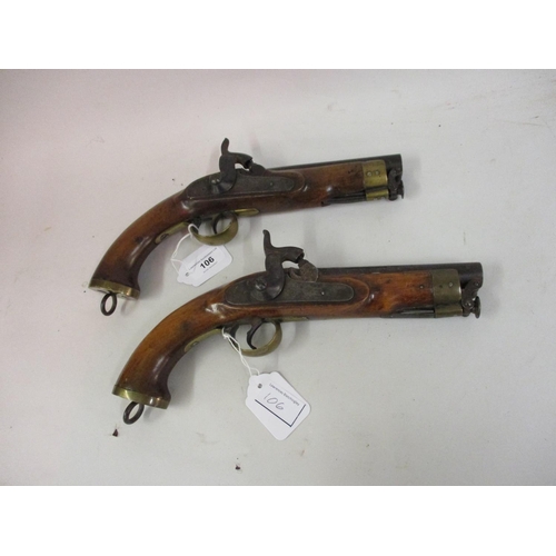 106 - Near pair of small 19th Century percussion pistols with integral ramrods and lanyard rings, engraved... 