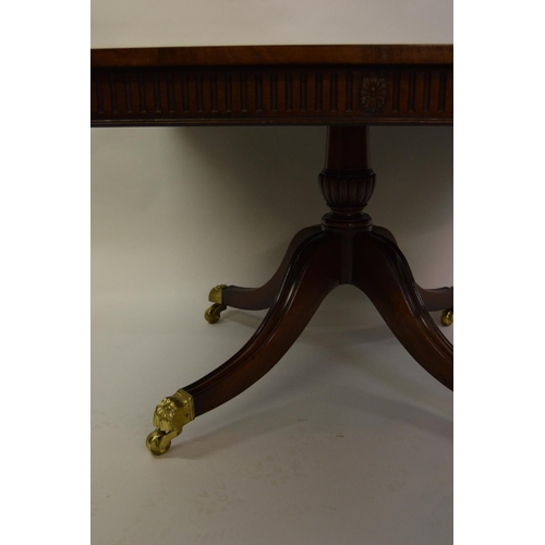 1358 - Good quality reproduction mahogany twin pedestal dining table, the crossbanded and line inlaid top a... 