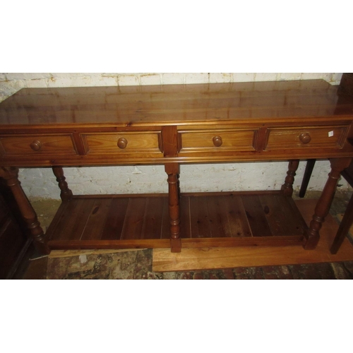 1378 - Reproduction pine dresser base, the moulded top above four frieze drawers, raised on baluster turned... 