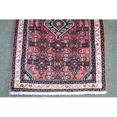 14 - Small Hamadan mat with medallion and Herati design on a rose ground with borders, 3ft x 2ft approxim... 