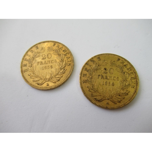 585 - Two French twenty franc gold coins, 1854 and 1855