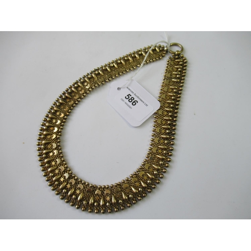 586 - Victorian gilt metal collar necklet of Turkish design, 18.5ins long including the ring clasp