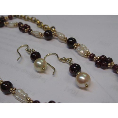 596 - Silver gilt and freshwater pearl necklace together with a pair of similar earrings