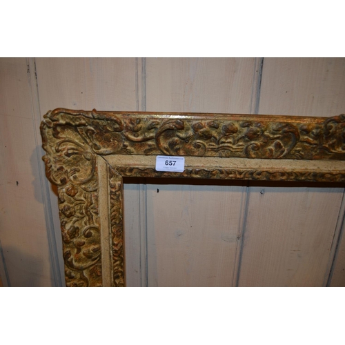 657 - Large rectangular swept gilt picture frame, 45.5ins x 25ins rebate, together with five other various... 