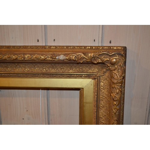 658 - Large rectangular gilt composition picture frame, 36.5ins x 24.25ins rebate, together with five othe... 