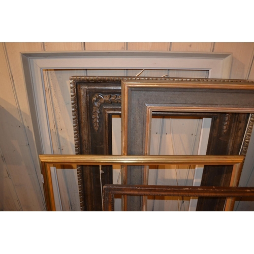 658 - Large rectangular gilt composition picture frame, 36.5ins x 24.25ins rebate, together with five othe... 