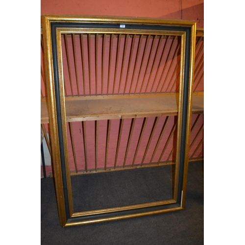 659 - Good quality modern rectangular gilt swept picture frame, 40ins x 30ins rebate, together with four o... 