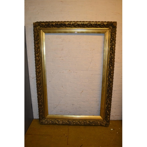 660 - Very large late 19th or early 20th Century rectangular gilt moulded composition picture or mirror fr... 