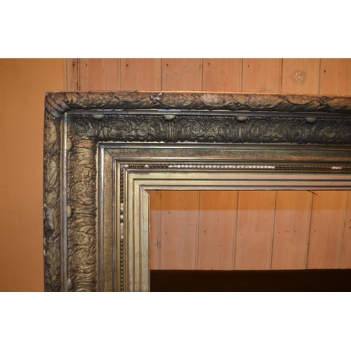 661 - Large 19th Century rectangular gilt composition frame, 50ins x 40ins rebate (at fault), together wit... 