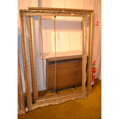 664 - Large gilt picture frame in French Empire style, 50ins x 40ins rebate, together with five other vari... 