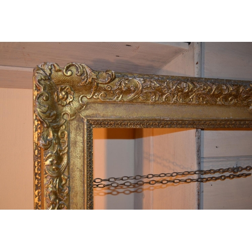 666 - 19th Century gilded composition swept frame, 32.5ins x 24.75ins rebate, together with four other var... 