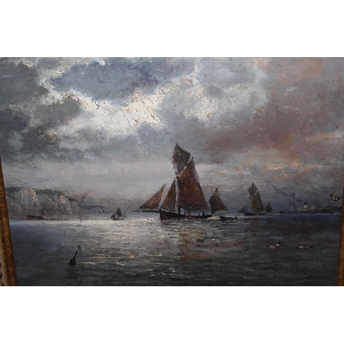 668 - Attributed to William Thornley, oil on board, shipping off the coast at sunset, 8ins x 10.5ins