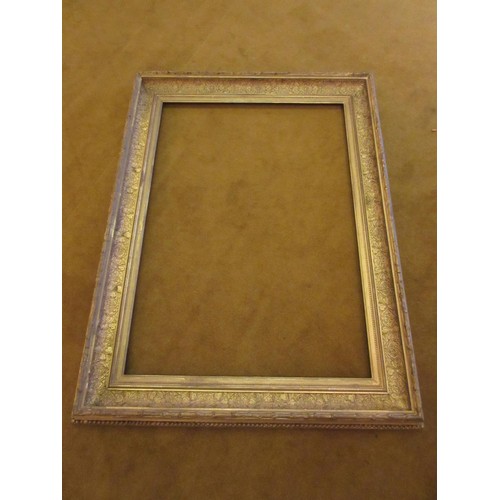 663 - Swept gilt picture frame, 43.75ins x 27.75ins rebate together with four other various frames