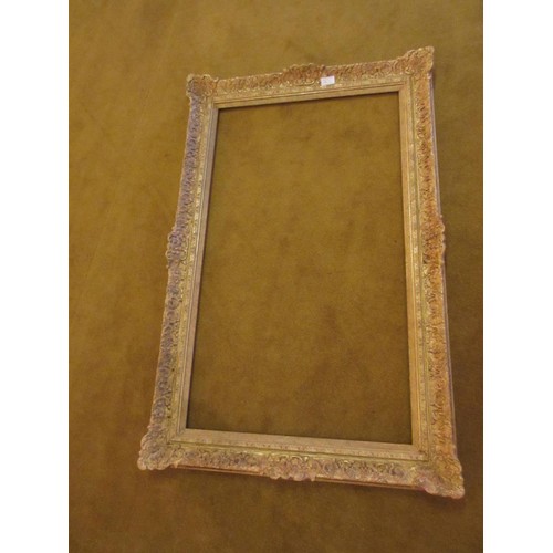 663 - Swept gilt picture frame, 43.75ins x 27.75ins rebate together with four other various frames