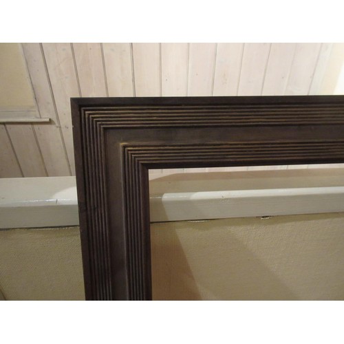 663 - Swept gilt picture frame, 43.75ins x 27.75ins rebate together with four other various frames