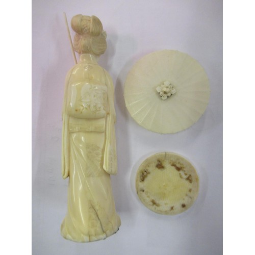 74 - Late 19th Century Japanese carved ivory figure of a fisherman and another of a Geisha girl holding a... 