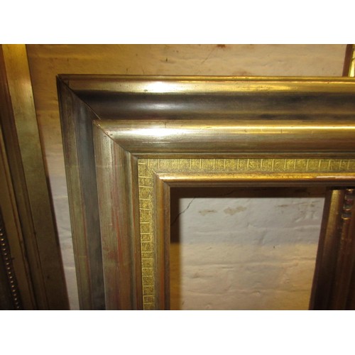 659 - Good quality modern rectangular gilt swept picture frame, 40ins x 30ins rebate, together with four o... 