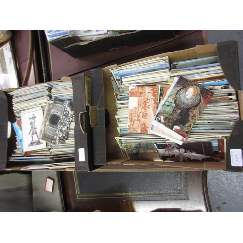 191 - Four boxes containing a large quantity of mid 20th Century postcards