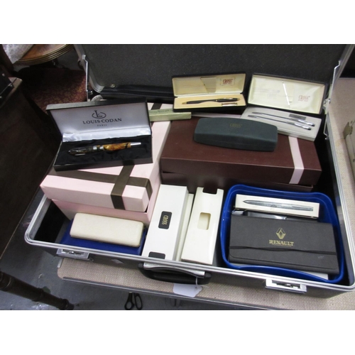 224 - Case containing a large quantity of modern and vintage ballpoint and fountain pens, together with an... 