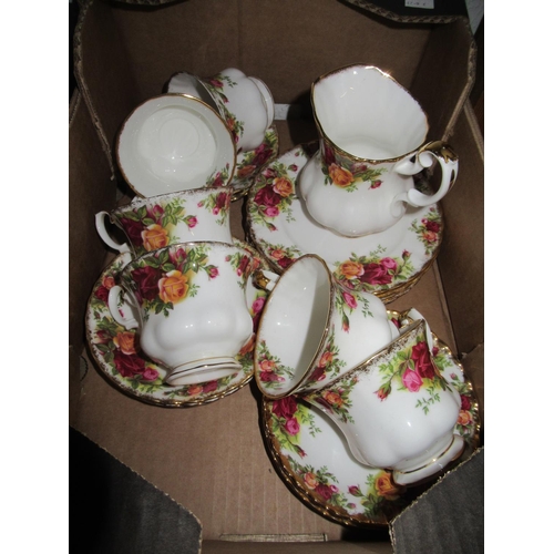 498 - Royal Albert Country Rose tea cups and saucers, side plates and cream jug, nineteen pieces in total