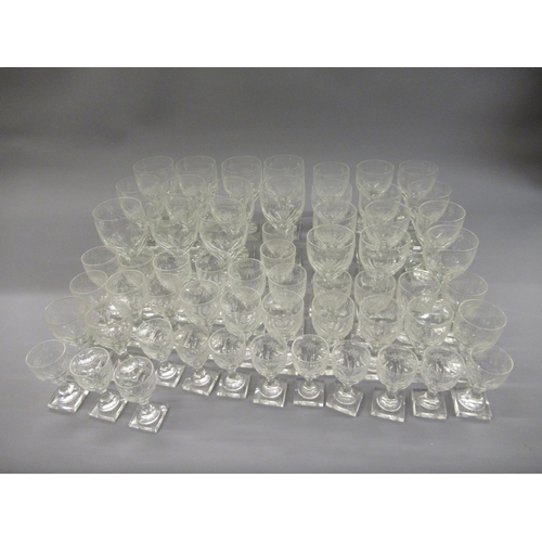 510 - Good quality suite of Edwardian drinking glasses etched with garlands of flowers, with faceted bowls... 