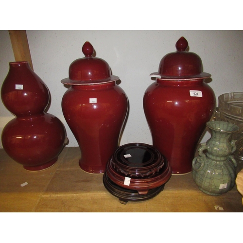 526 - Pair of large reproduction Chinese sang du boeuf temple jars with hardwood bases, 20ins high overall... 