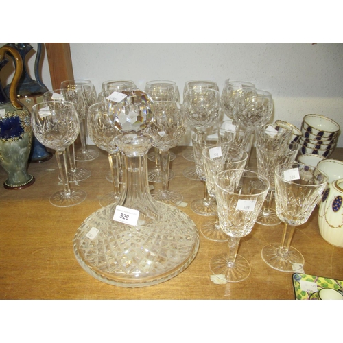 528 - Thirteen Waterford hock glasses together with six Waterford wine glasses and another (at fault) and ... 