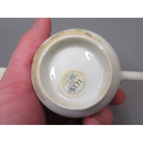 552 - Pair of Chinese Nanking Cargo Daisy Terrace pattern teacups (with Christie's labels, one at fault)