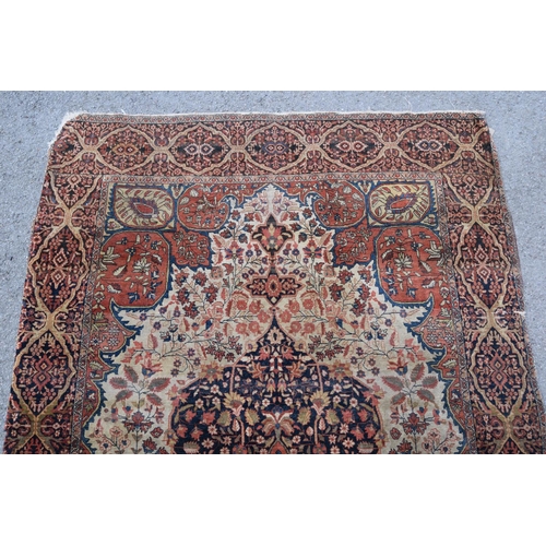 6 - Tabriz rug with a medallion and all-over stylised floral design, with corner designs on an ivory gro... 