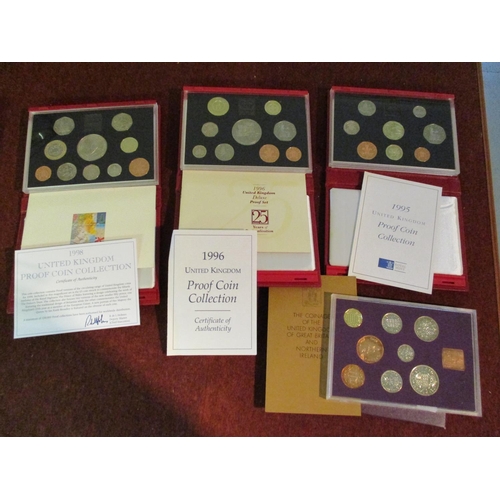 679 - Three United Kingdom proof coin sets, 1995, 1996 and 1998, together with a similar set 1970 and a ca... 