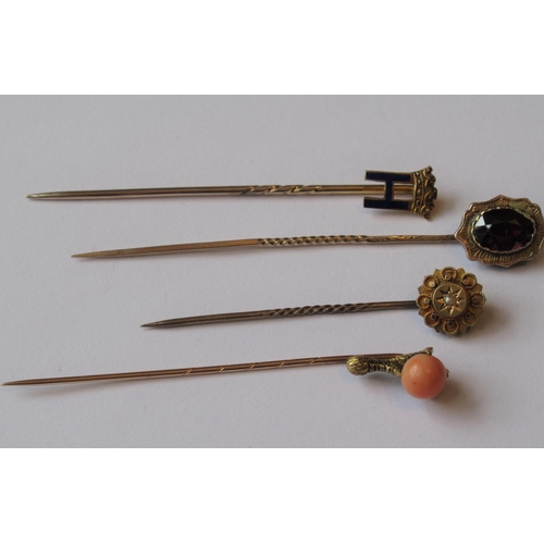 728 - Group of four various 19th Century gold stick pins