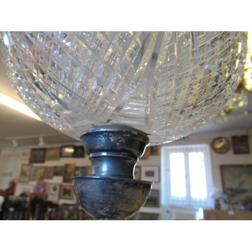 620C - Early 20th Century silver plated oil lamp, the hobnail cut glass oil well supported by a classical m... 