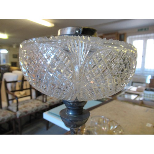 620C - Early 20th Century silver plated oil lamp, the hobnail cut glass oil well supported by a classical m... 