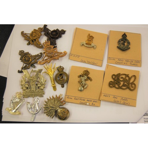 279 - Large collection of loose and mounted on card military badges, with two small boxes of military butt... 