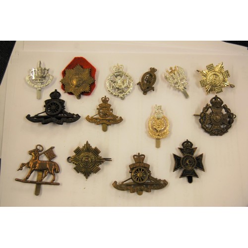 279 - Large collection of loose and mounted on card military badges, with two small boxes of military butt... 