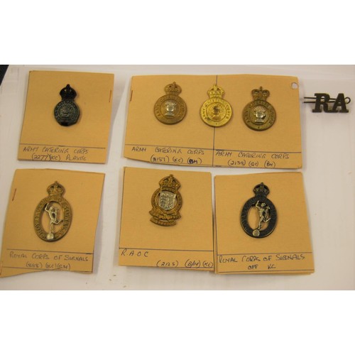 279 - Large collection of loose and mounted on card military badges, with two small boxes of military butt... 