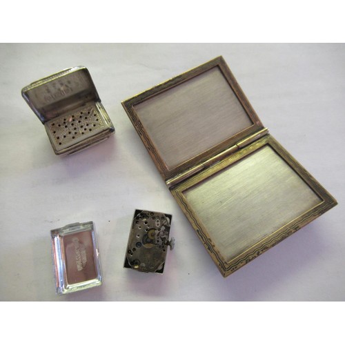 691 - Miniature white metal folding photograph frame, Victorian silver vinaigrette and a Swiss watch movem... 