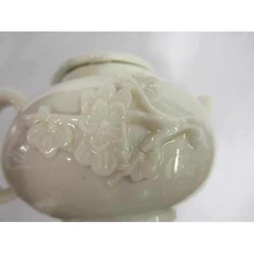 482 - Antique Chinese blanc de chine miniature teapot with floral relief moulded decoration (cover restore... 