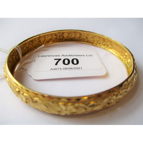 700 - Indian floral embossed yellow metal bangle, 15g