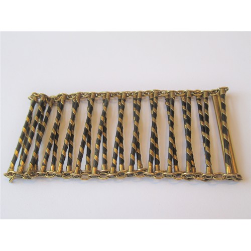 706 - Unusual yellow metal mounted bracelet of ladder design