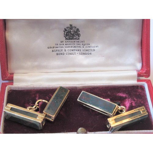 710 - Cased pair of Aprey and Company rectangular 18ct gold bloodstone set cufflinks