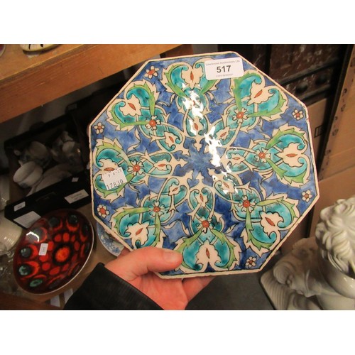 517 - Octagonal Isnik floral decorated tile, 8.75ins wide