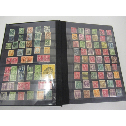 134 - Black stock book containing a large collection of 19th / 20th Century, American stamps